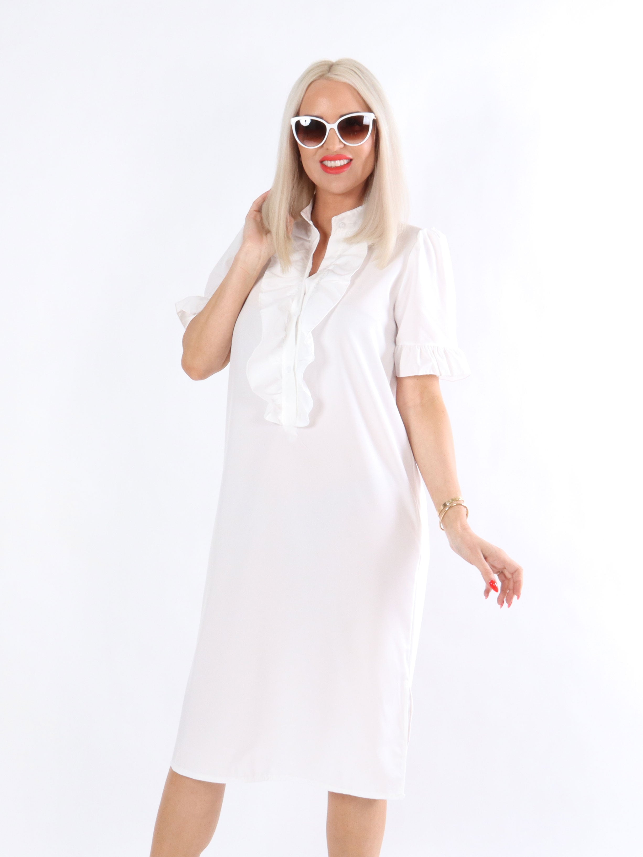 Sigga - Klänning med volanger och puffärmar